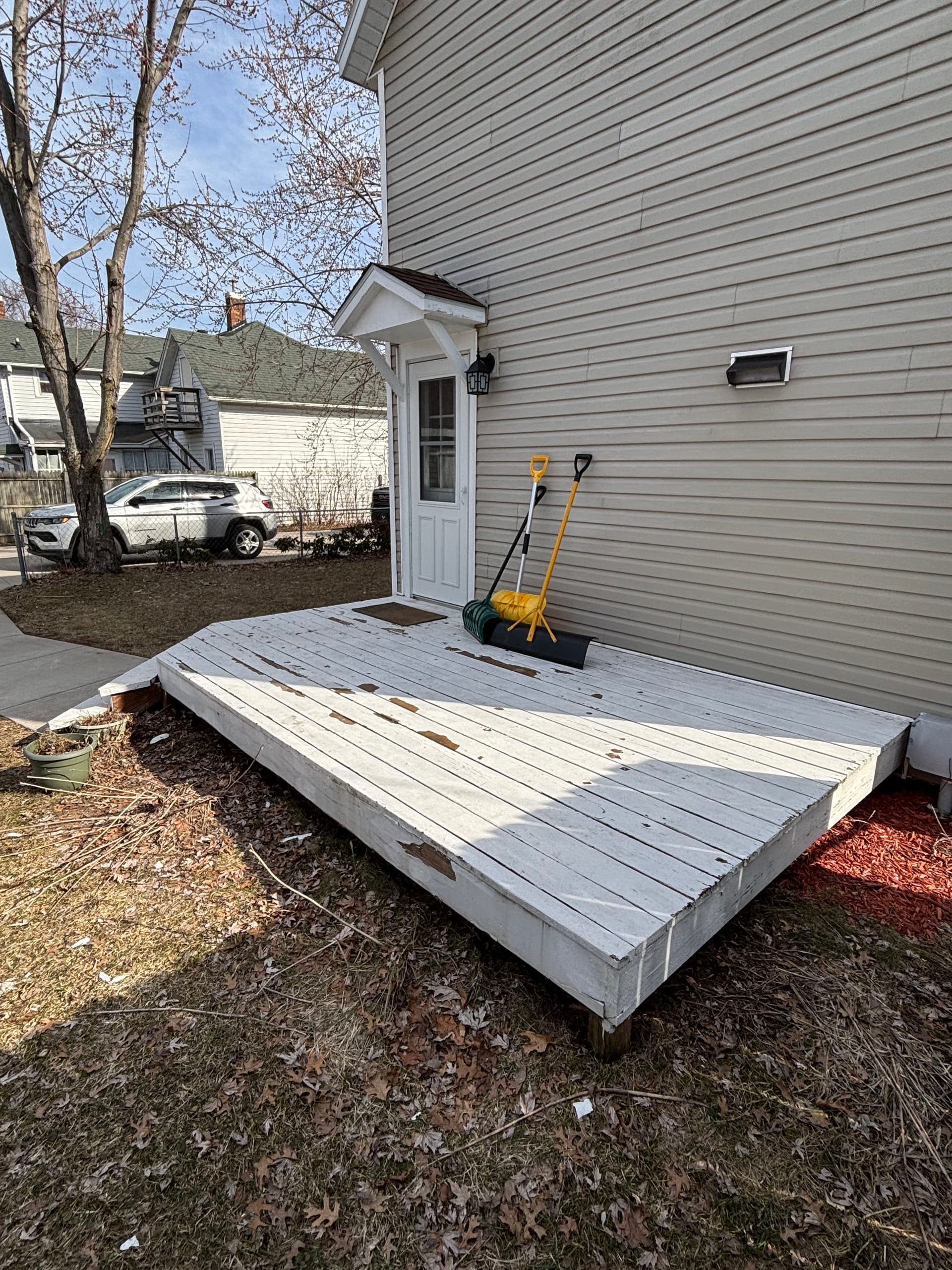 Deck Rebuild with New Boards, Stairs, and Black Aluminum Railings image