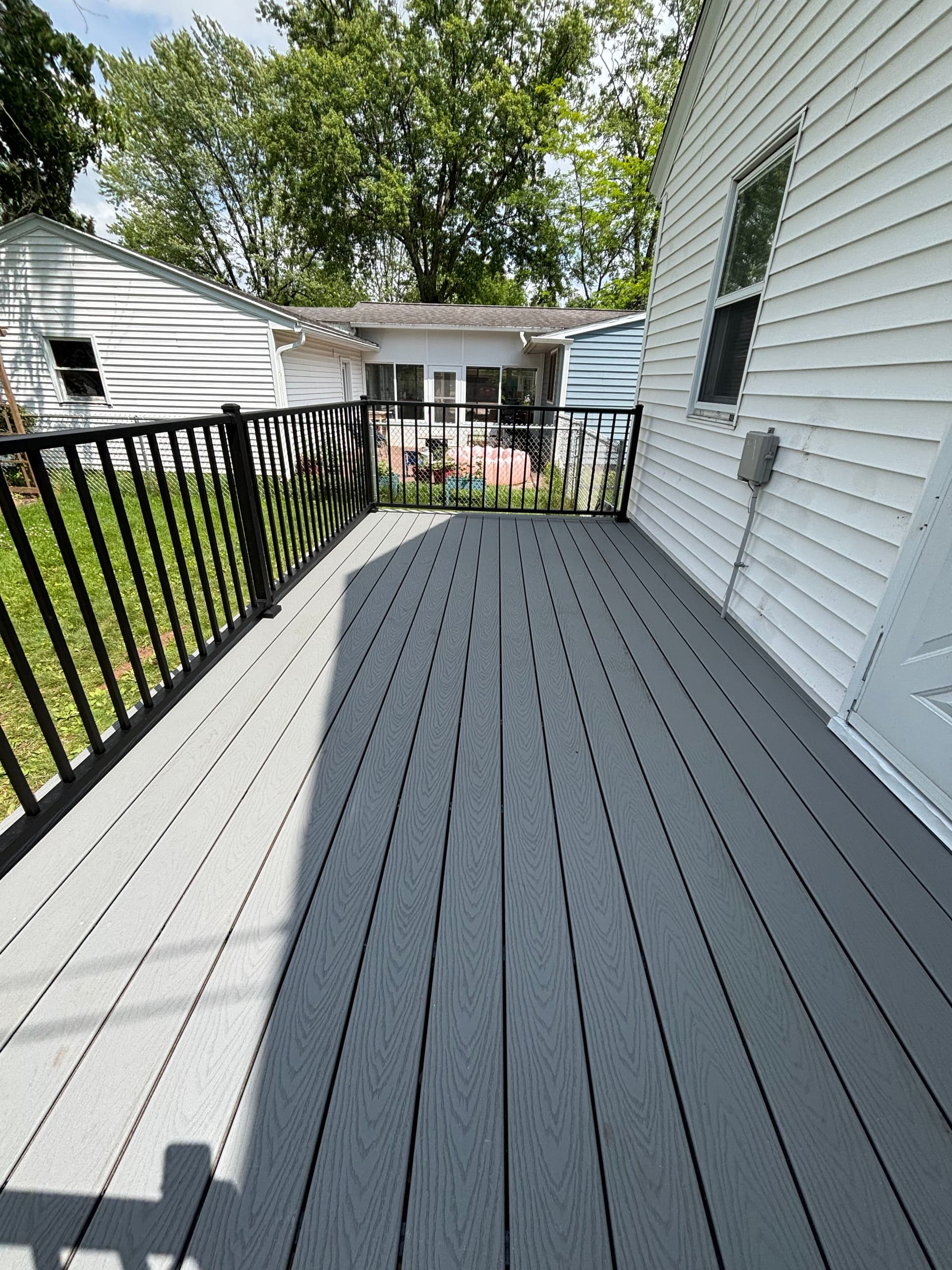 Gallery photos for Low-Maintenance Trex Deck Build with Black Aluminum Railings: Image #2
