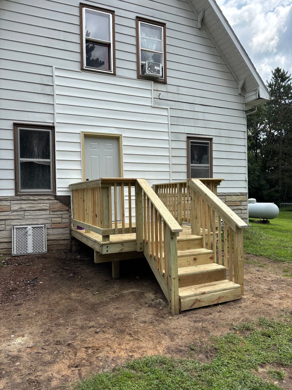 Gallery photos for Safety-Focused Deck Installation for Rental Home: Image #1